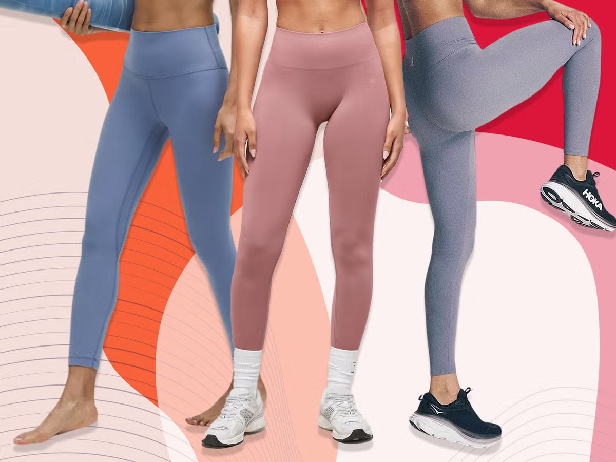 A collection of folded yoga leggings in different colors and textures