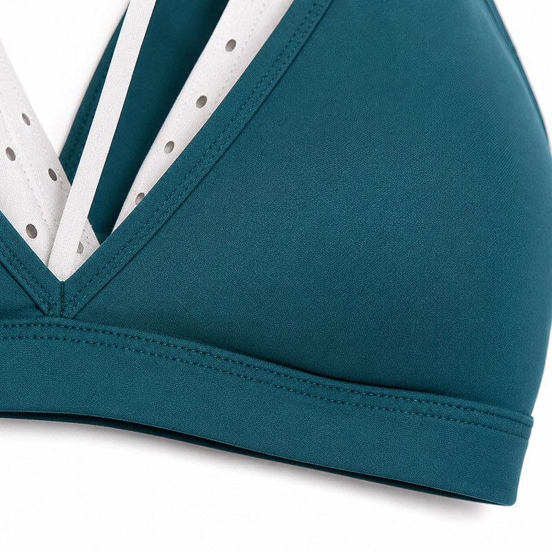 Fitness training in custom V-neck contrast yoga crop top