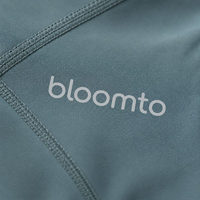 Custom Bloomto logo application on activewear fabric