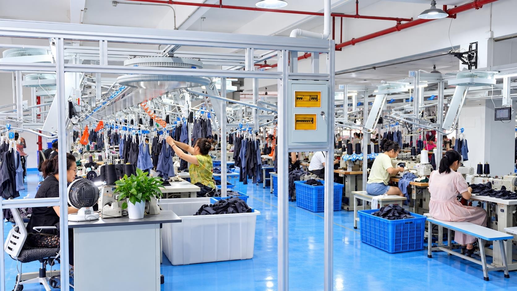 Custom leggings factory production floor with activewear sewing lines