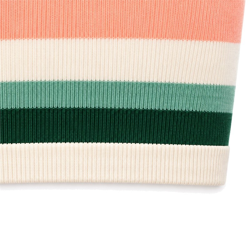 Colorful sports bra lower edge with cream finishing and green coral stripes