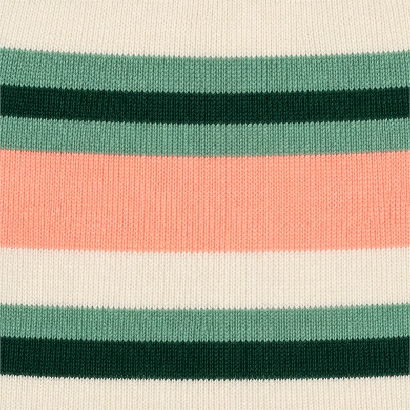 Fine knit texture of colorful sports bra fabric in coral cream and green