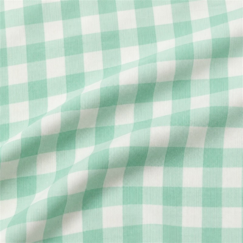 Mint and white gingham fabric close-up for the two-piece yoga set