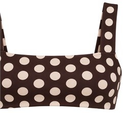Close-up of the square neckline and broad straps on the polka dot crop top