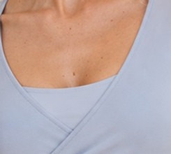 Close-up of the overlapping V-neck panels and finished neckline
