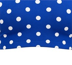 Close-up of lower-edge stitching and white dot placement on the blue yoga bra