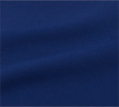 Close-up of the smooth solid navy fabric surface