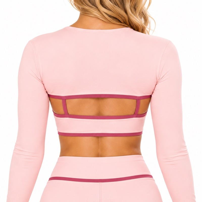 Close-up of the layered set back cutout, narrow connecting straps and stitched contrast edges