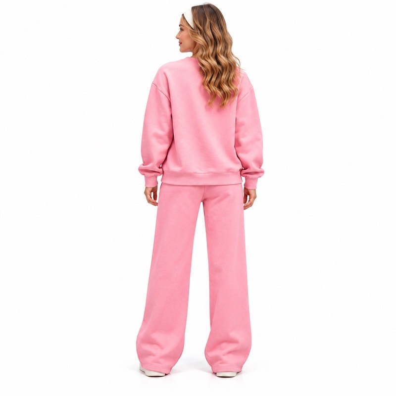 Back view of the pink fleece sweatshirt set showing dropped shoulders and relaxed sleeves