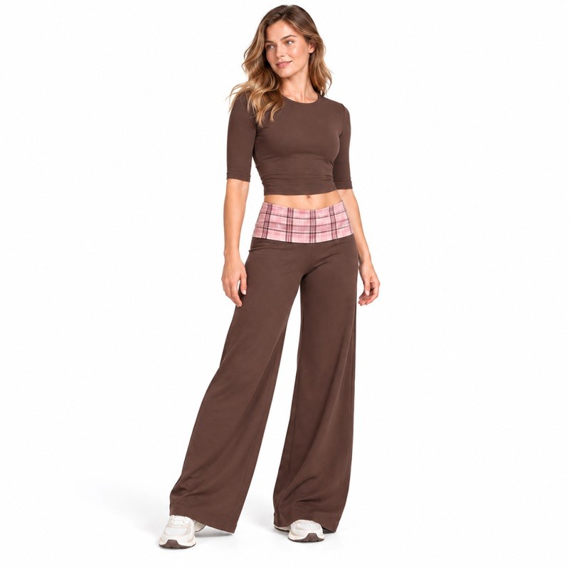 Front view showing the pink plaid fold-over waistband on the brown yoga pants