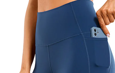 High-waisted blue leggings with hidden side pocket and human-centered design details