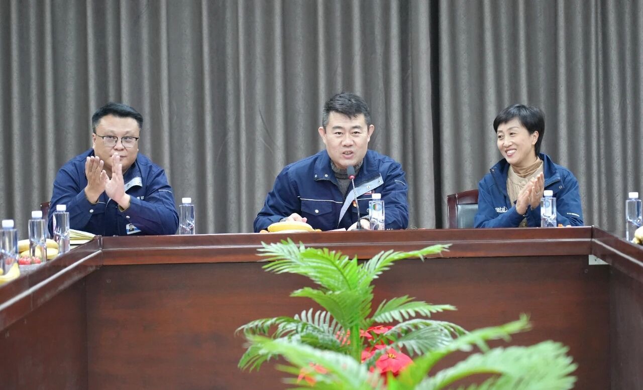 Company representatives extended holiday greetings to all female employees.