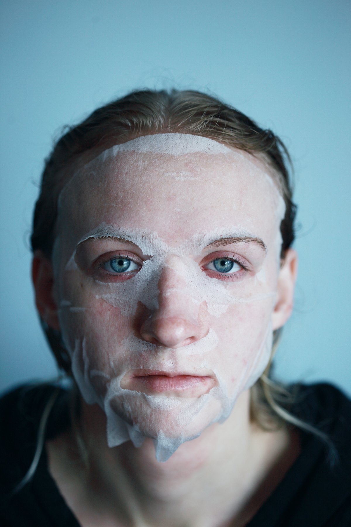 Close-up of a shopper applying a treatment patch at home