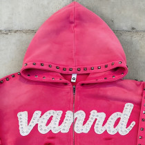 Custom zip up hoodie with stud trim and raw hem