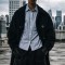 Custom bomber jacket in washed black hooded style