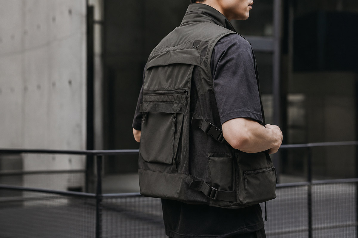 Technical vest and outerwear trims with zippers webbing pockets and nylon fabric details