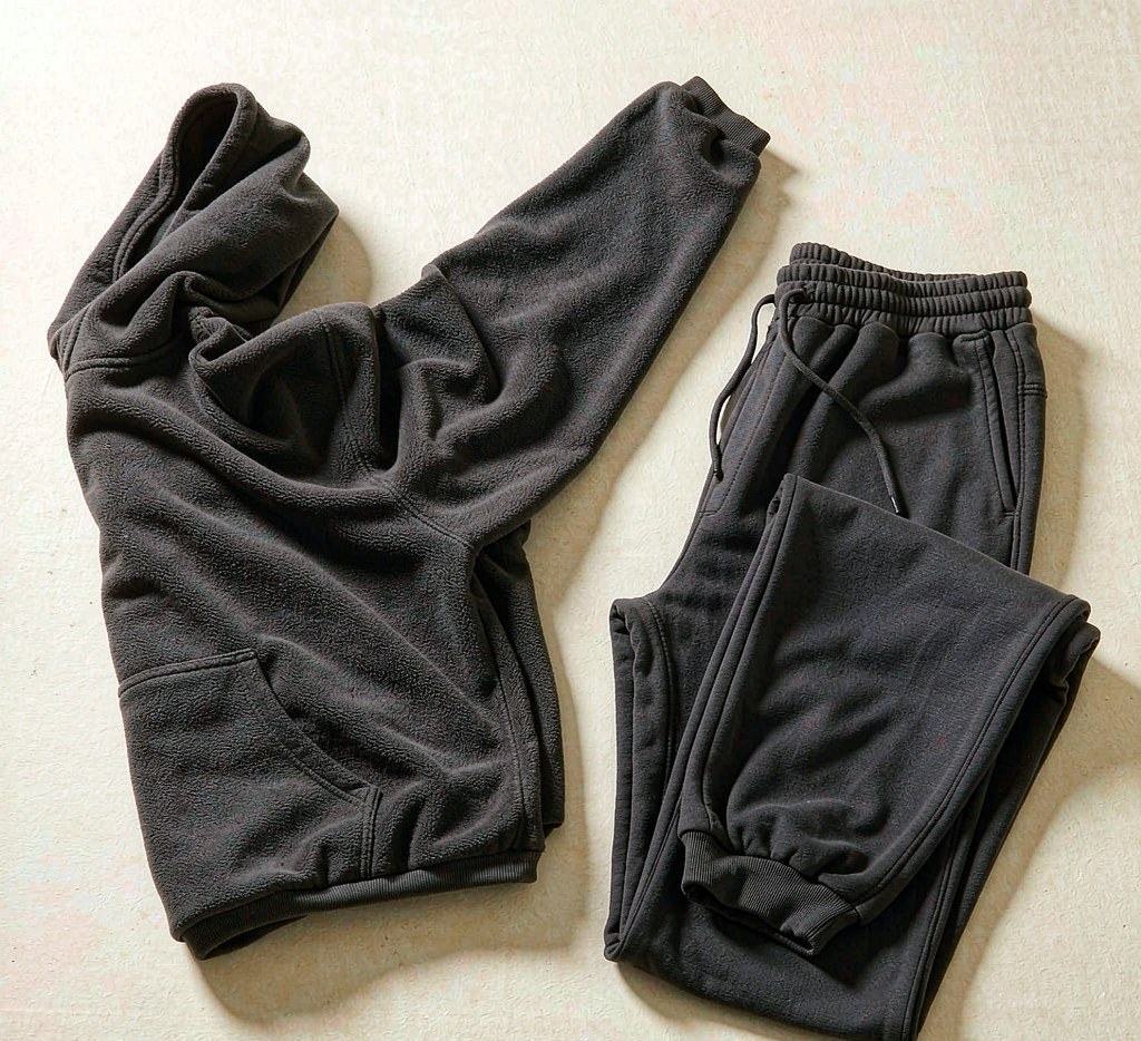 Charcoal hoodie and sweatpants presented together as a coordinated set