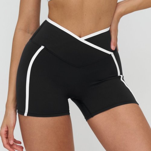 Nude-feel color-blocked yoga shorts with cross-waistband, tight-fitting shorts for outdoor running and fitness.