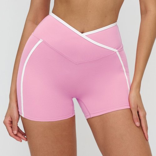 Nude-feel color-blocked yoga shorts with cross-waistband, tight-fitting shorts for outdoor running and fitness.