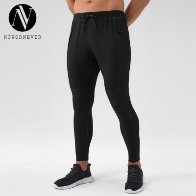 OEM & ODM Men's Nylon Yoga Fitness Pants - Item No. 31343 - Zipper Pockets, Naked Feeling, Quick Dry Sports Pants for Wholesale and Sourcing Agents - Calf Skinny Fit for Activewear Brands