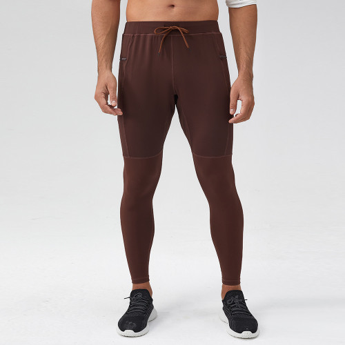 OEM & ODM Men's Nylon Yoga Fitness Pants - Item No. 31343 - Zipper Pockets, Naked Feeling, Quick Dry Sports Pants for Wholesale and Sourcing Agents - Calf Skinny Fit for Activewear Brands