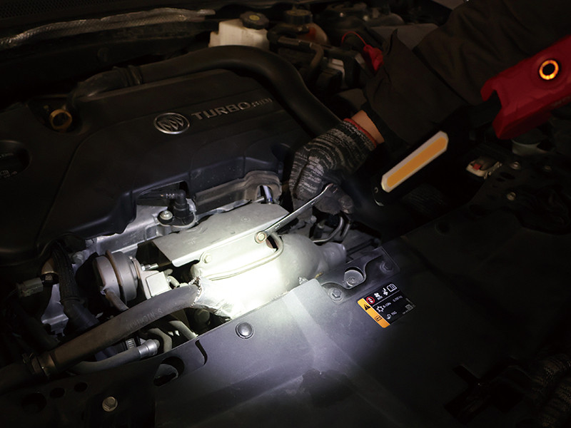inspection work light providing illumination for automotive engine inspection