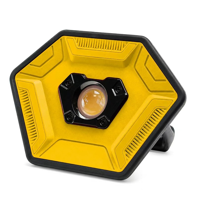 yellow OEM led flood light with black protective edging and adjustable stand, front product view