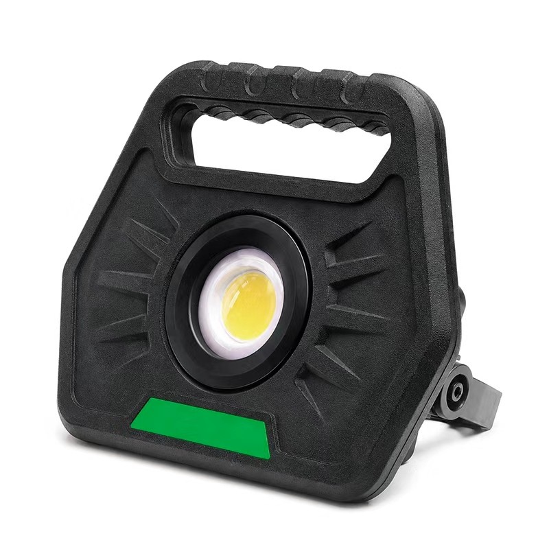 green custom work flood light with black housing, portable handle and swivel stand