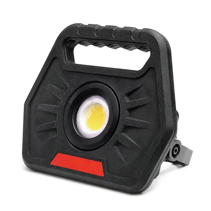 red custom work flood light with black housing, portable handle and swivel stand