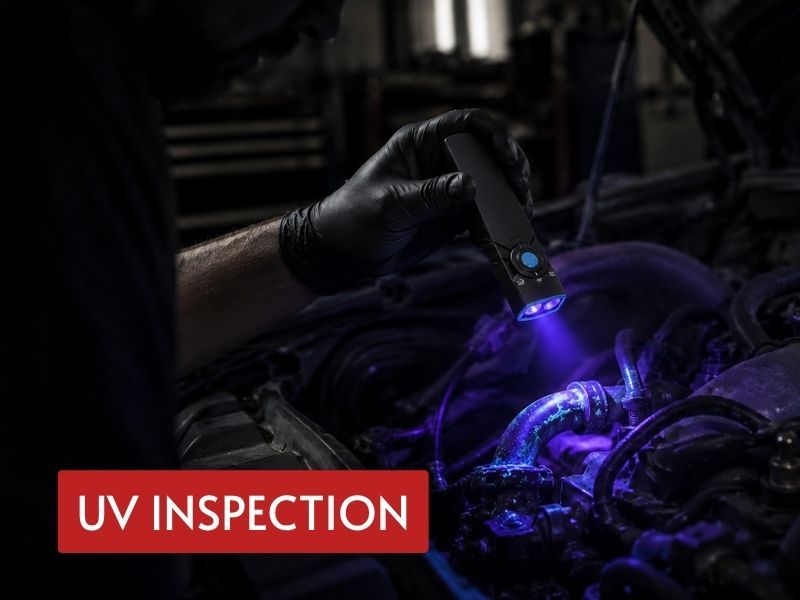 edc flashlight with uv used to check fluorescent traces around automotive engine components