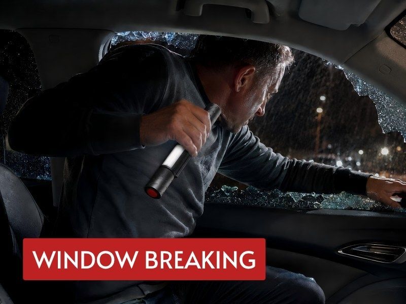 auto rechargeable flashlight used as a glass breaker during emergency vehicle escape