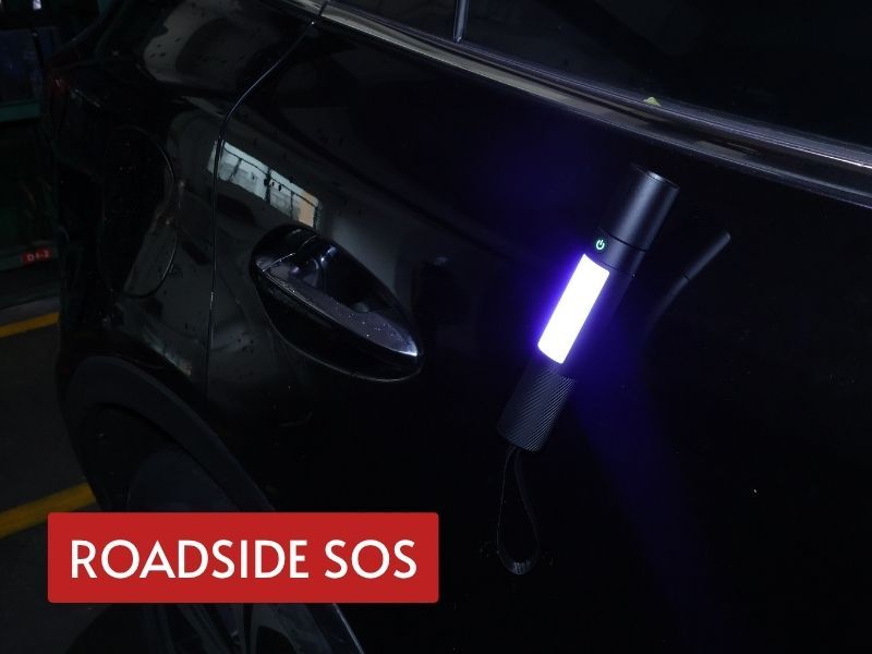 car led emergency flashlight magnetically attached to a vehicle with side SMD light active for roadside visibility