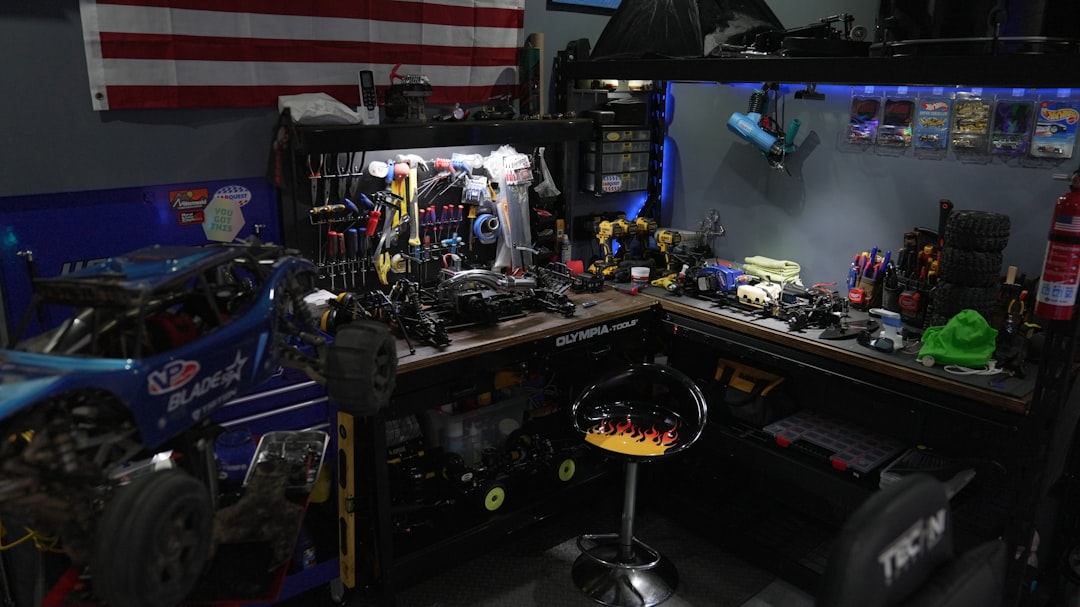 A collection of modern multi-functional penlights on a workshop bench