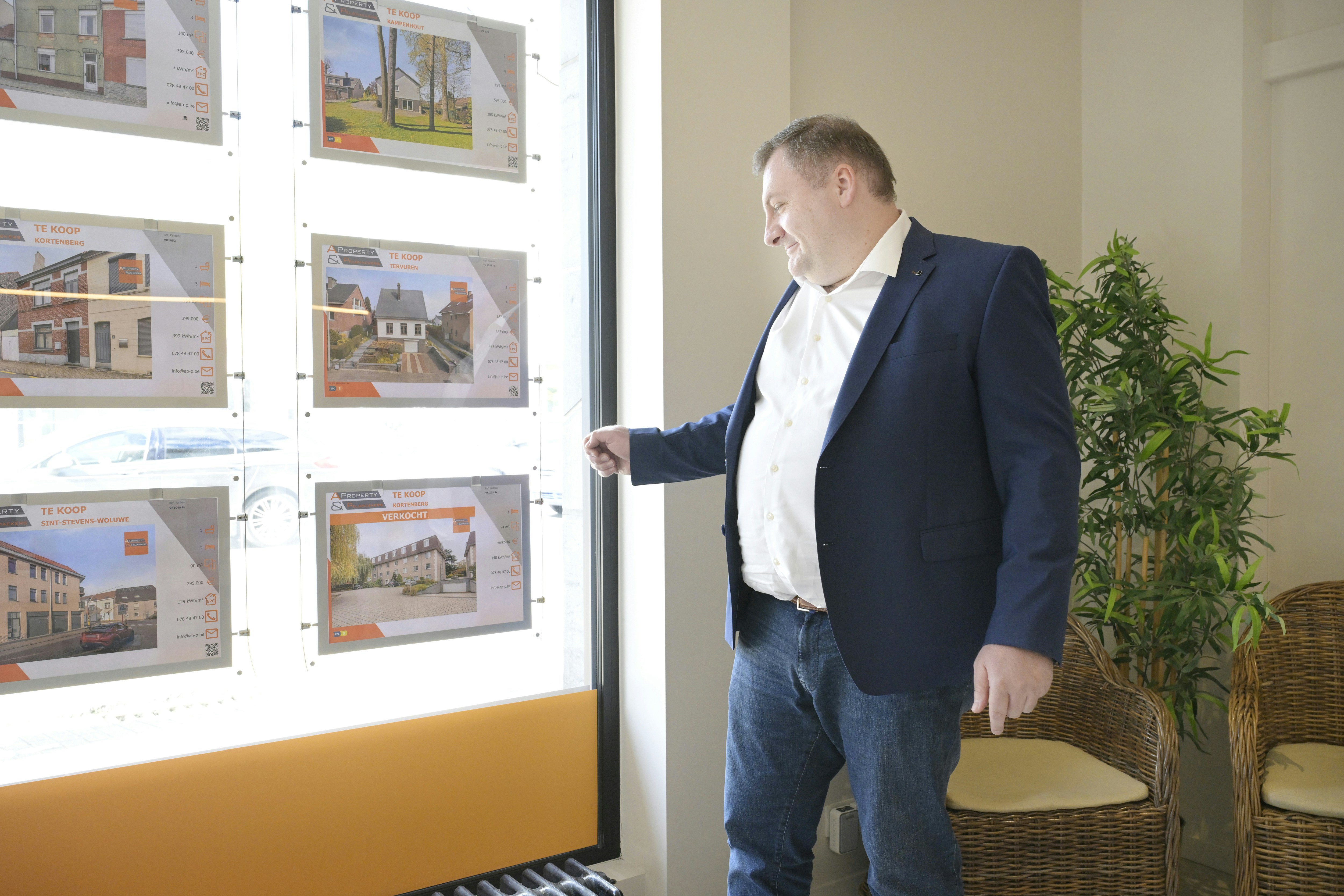 A brand manager selecting a work light from a digital factory catalog