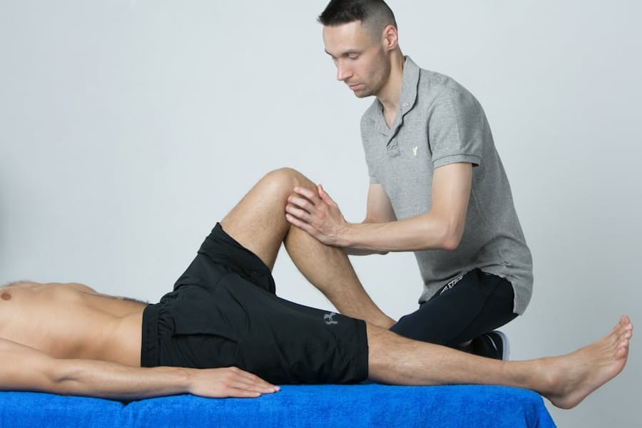 Physical therapist examining a patient's leg for recovery planning
