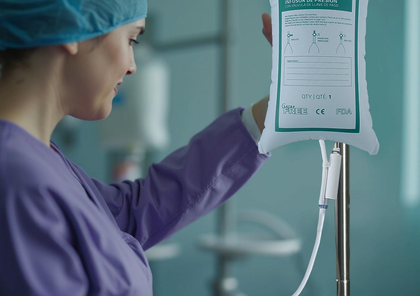 Clinical use scene of an InfuSure DIB-P pressure infusion bag on an IV pole