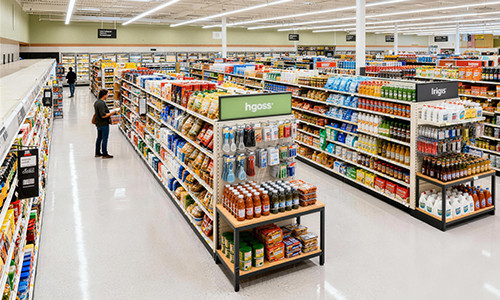 Spacious Supermarket Aisle Stocked with Groceries