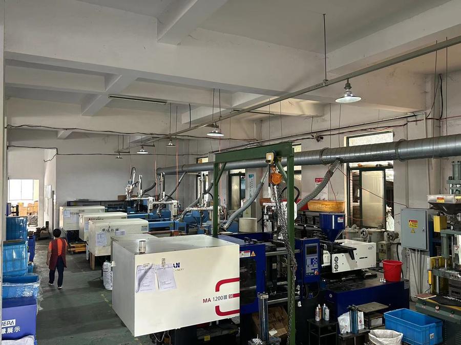Injection molding workshop producing plastic display components