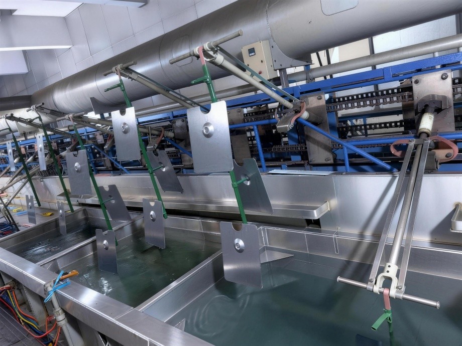 Surface treatment line at the display factory where metal frames are finished before assembly