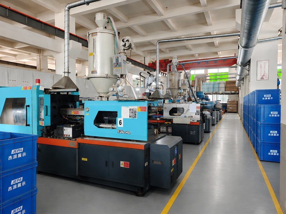 Injection moulding machines producing plastic display components, the tooling base that makes ODM adaptation fast