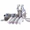 Semi Automatic Spout pouch packaging machine for liquid with four heads