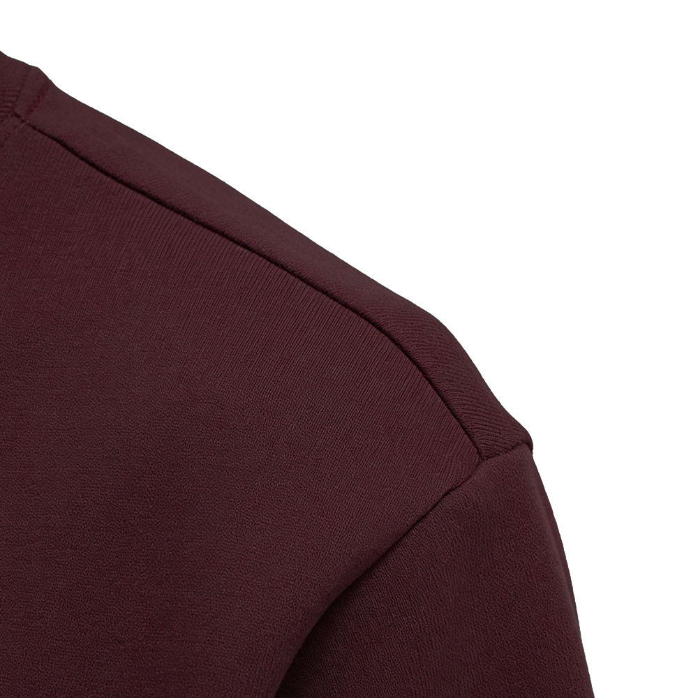 Drop shoulder seam detail view highlighting stitching quality