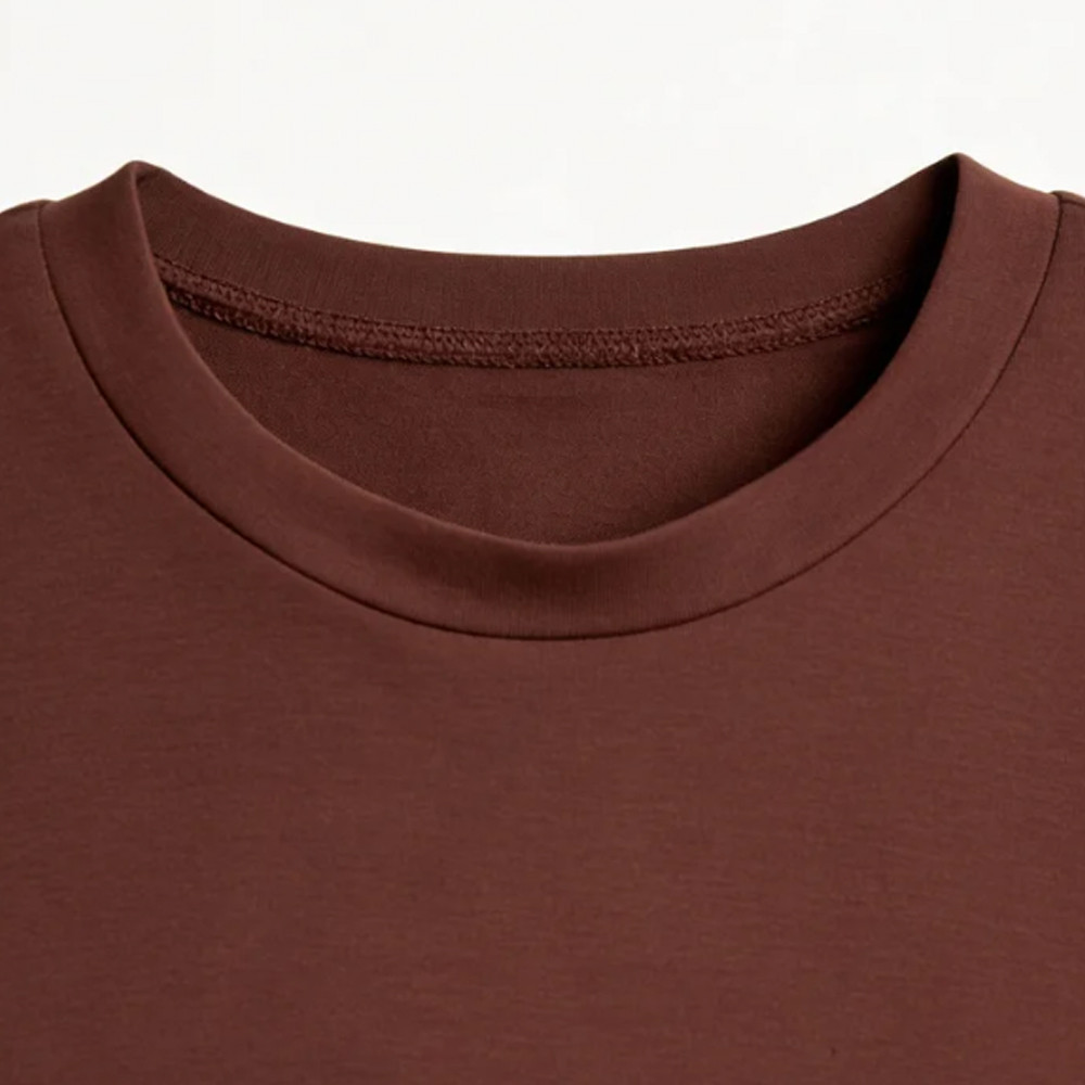 Crew neck detail of brown modal sweatshirt