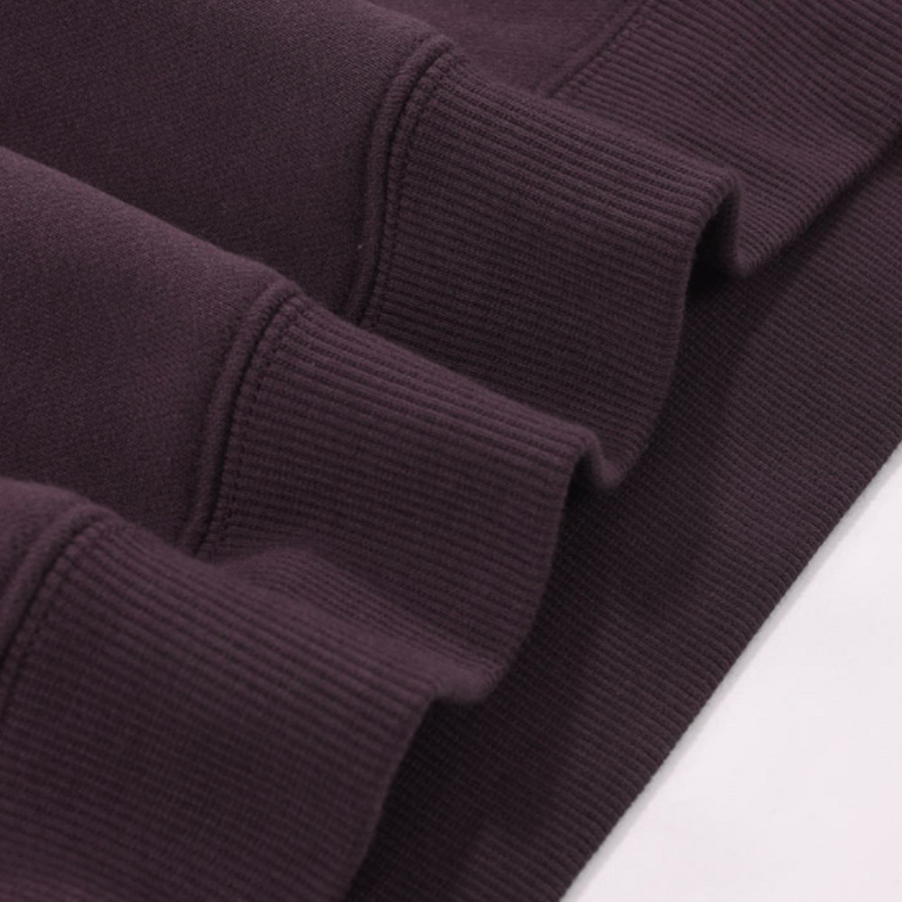 Ribbed cuff and hem detail on fleece hoodie