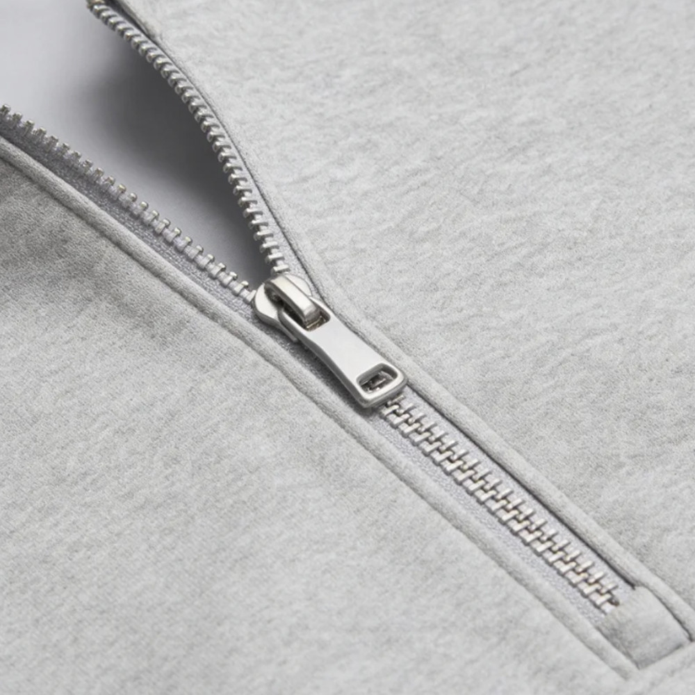 Quarter zip metal zipper detail on funnel neck