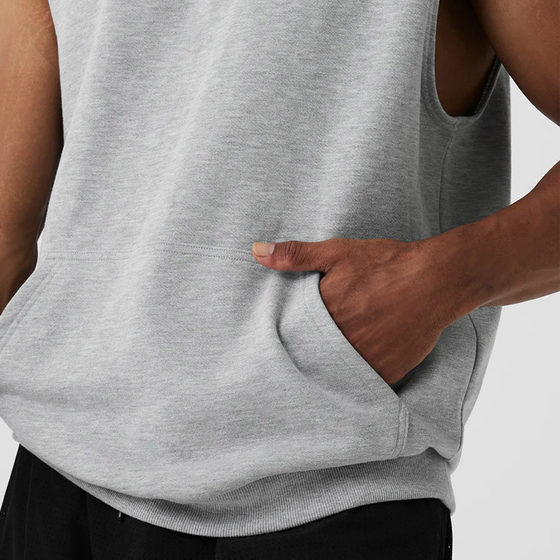 Kangaroo pocket detail on french terry gym top