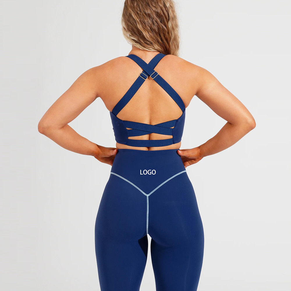 Cross back high support sports bra with gold hardware details