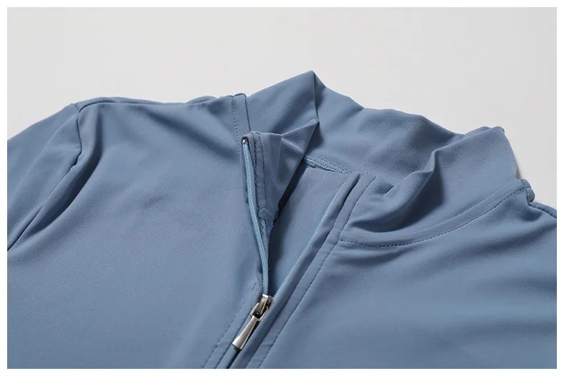 Blue half zip mock neck collar detail