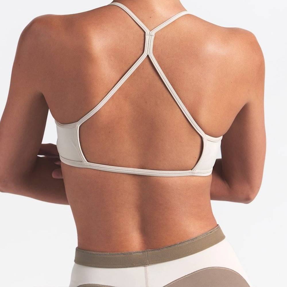 Spaghetti strap racerback detail on polyester spandex yoga bra