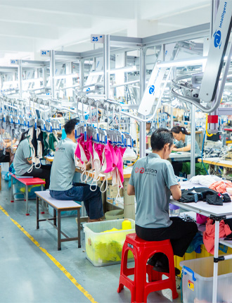 Large-scale sportswear manufacturing production line in Humen factory showing flexible capacity for mass orders.